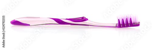 New toothbrush with reflection on white background. photo