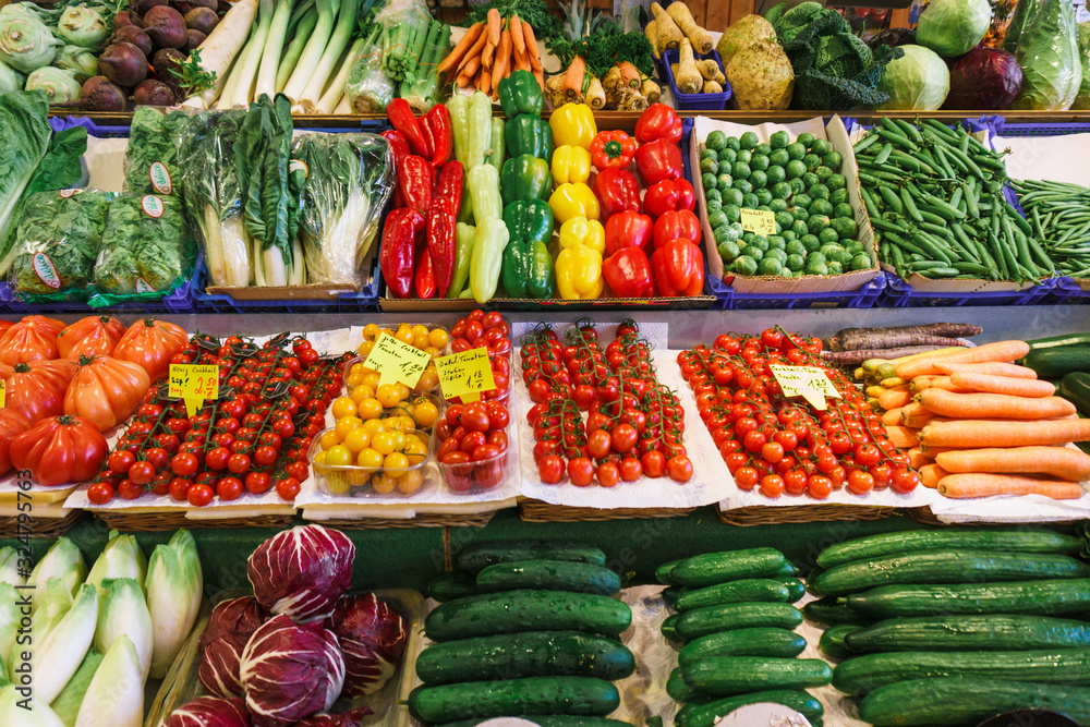 Fruit and vegetable market. Lots of different fresh fruits and vegetables. Fruit and vegetable market. Lots of different fresh fruits and vegetables.