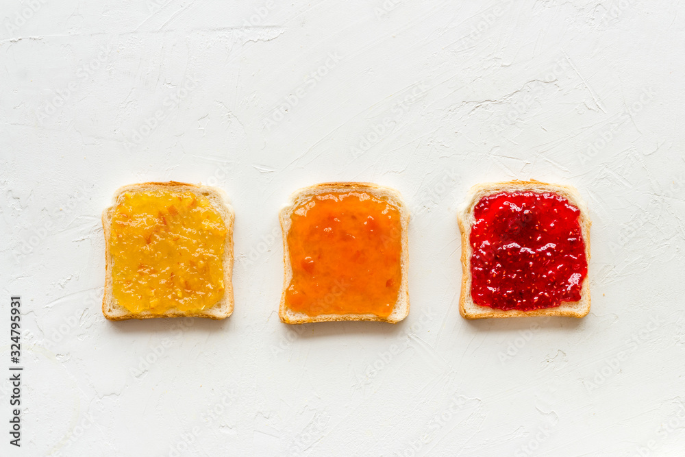 Toast with jam. Colorful set on white background top-down copy space Toast with jam. Colorful set on white background top-down copy space
