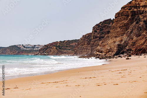 Beautiful view of the sea waves from the rocks in algarve, Portugal