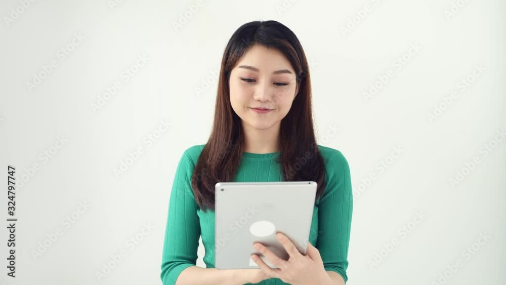 woman using digital tablet isolated on white woman using digital tablet isolated on white