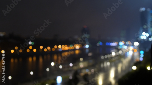 Night traffic on the road and moving cars in the city. Blurred bokeh background © emaria