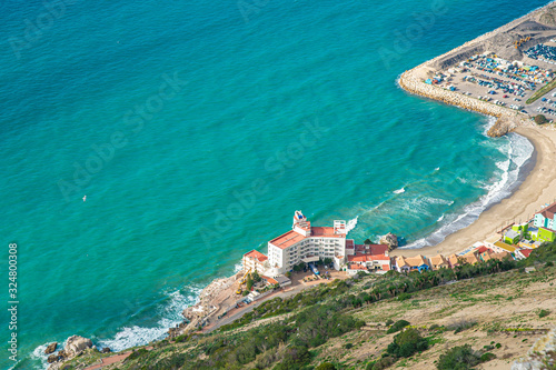 panorama of exotic coast with hotel by the sea with crystal clear tercis color water, paradise for relaxation