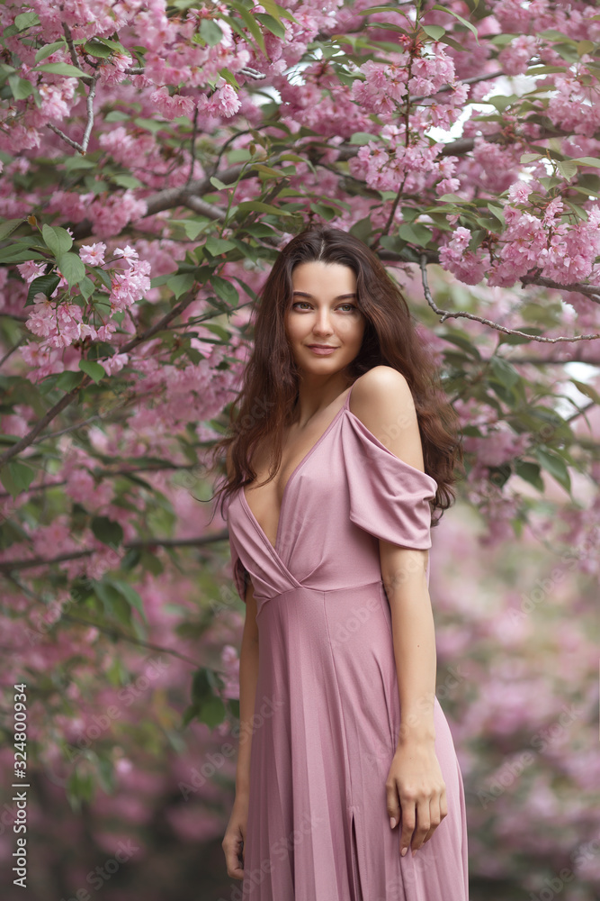 Woman at Blossoming Sakura Tree on Nature