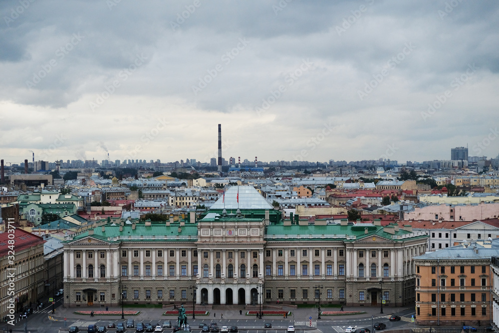 View on the top of the roofs of Saint Petersburg. View on of St. Petersburg city from the colonnade of St. Isaac's.