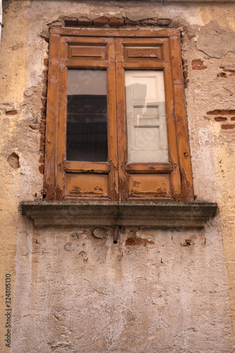 old windows of an abandoned home