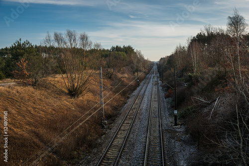 Railroad tracks on a sunny morning near Gora Kalwaria, Mazowieckie, Poland
