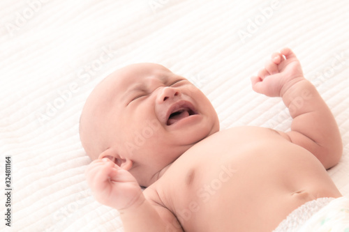 Принти на полотні Newborn baby crying sick fever, get flu check up at clinic, Asian child infant 0