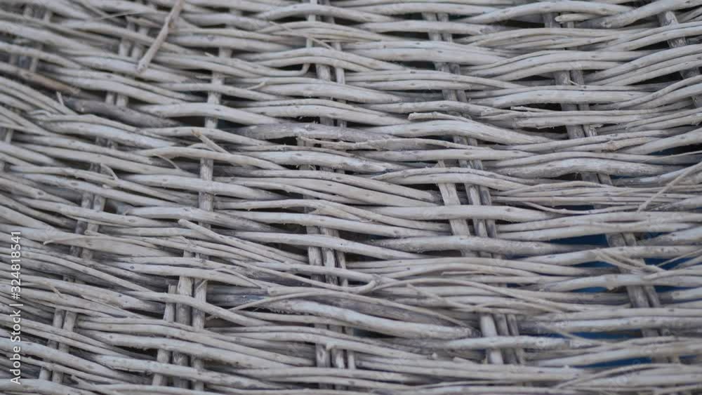 rattan decorative furniture material close-up 4K 2160p 30fps UltraHD tilting footage - Natural wicker artificial container texture slow tilt 3840X2160 UHD video