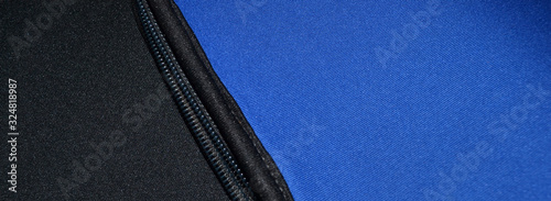 blue and black neoprene fabric with zip