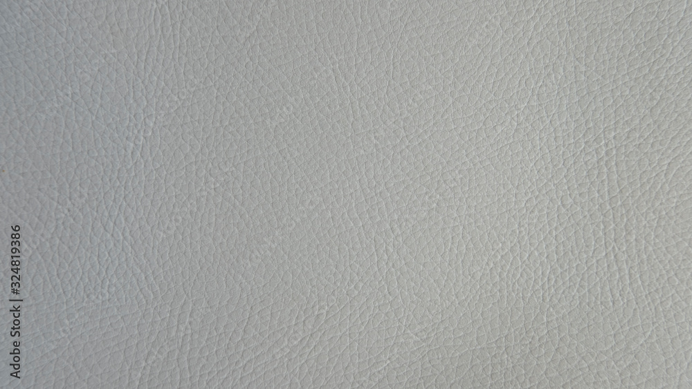 Light grey artificial or synthetic leather background with neat texture and copy space, colorful fabric sample with leather-like finish aimed for upholstery, fashion, sewing or footwear projects Light grey artificial or synthetic leather background with neat texture and copy space, colorful fabric sample with leather-like finish aimed for upholstery, fashion, sewing or footwear projects