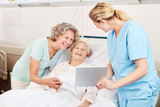 Nurse with tablet computer