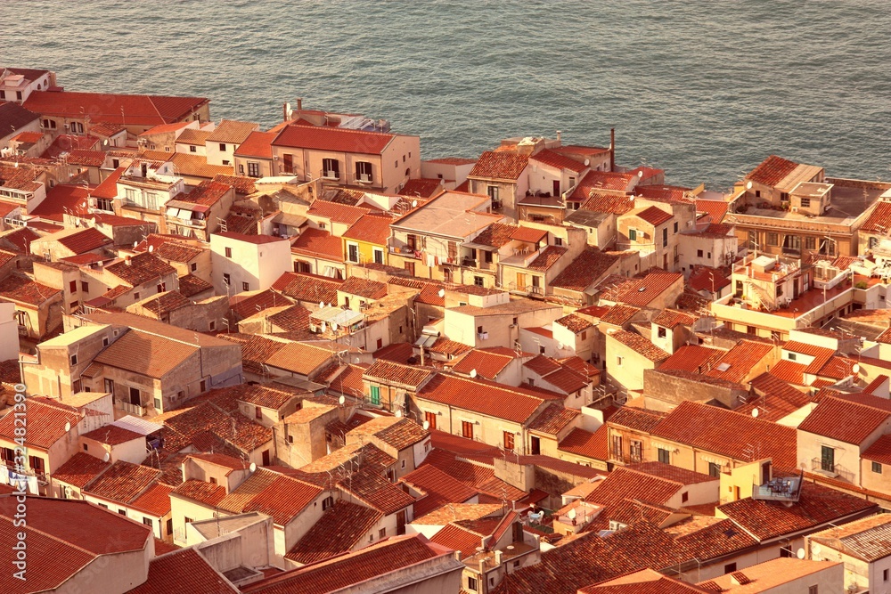 Sicily - Cefalu town aerial view. Vintage style filtered colors.