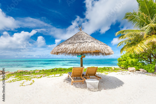 Beach chairs and umbrella in paradise beach. Tropical vacation holiday banner  summer landscape