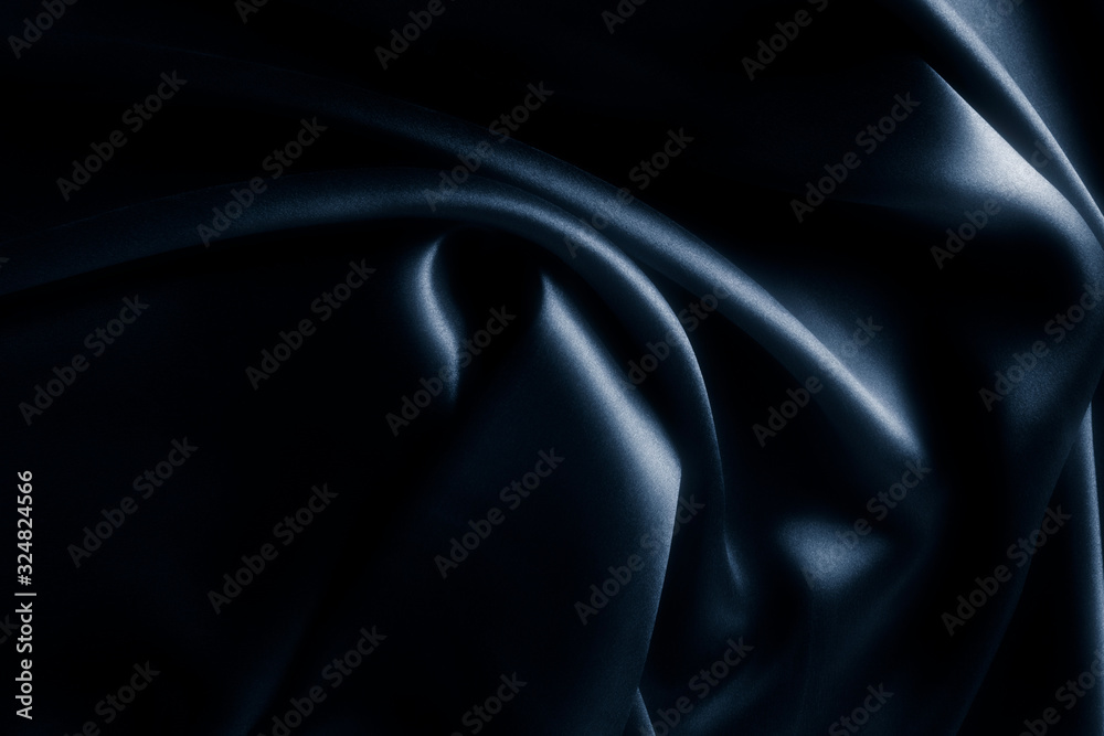 Satin blue silk background, close-up Satin blue silk background, close-up