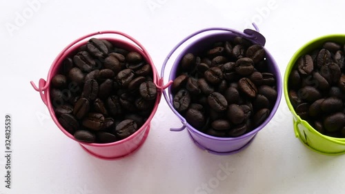 organic coffee beans in bucket. aroma coffee seed white background