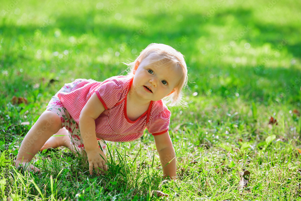 little baby learns to crawl in nature little baby learns to crawl in nature