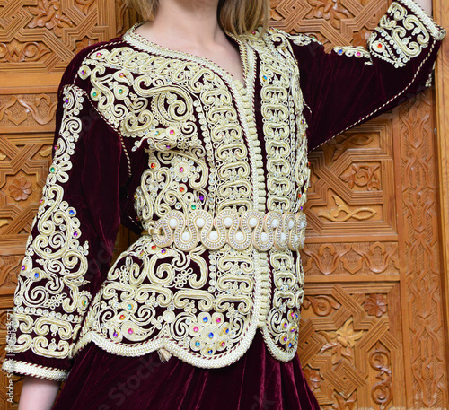 Moroccan caftan, Moroccan Dress . Traditional Moroccan dress worn by women at weddings. One of the most famous clothes in the world photo