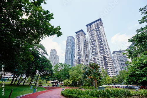 Cityscape with modern buildings and park. Kuala-Lumpur, Malaysia.