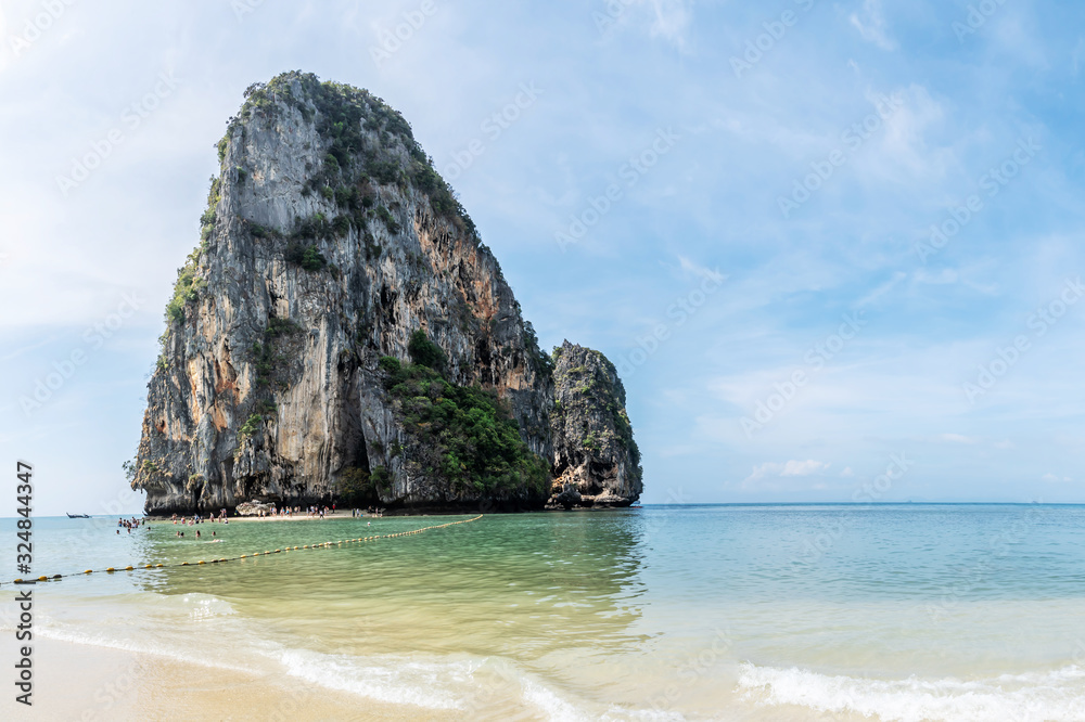 Tropical holidays - Stunning view of Railay Beach with limestone rock in Krabi, Thailand.