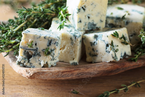 Pieces of blue cheese with thyme.