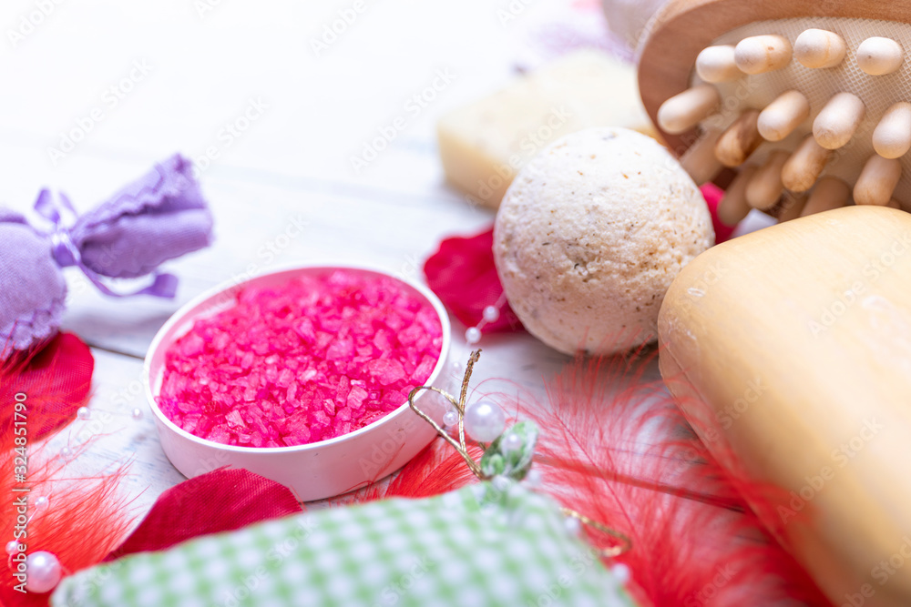 Spa kit or set concept with natural organic products on wooden table. Soft focus soap bar and liquid. Aromatherapy pink salt. Still life with copy space for your text. Spa kit or set concept with natural organic products on wooden table. Soft focus soap bar and liquid. Aromatherapy pink salt. Still life with copy space for your text.