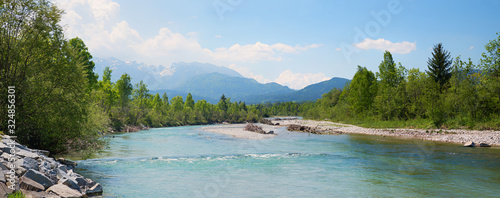 isar river near lenggries, with mountain view and turquoise water at springtime