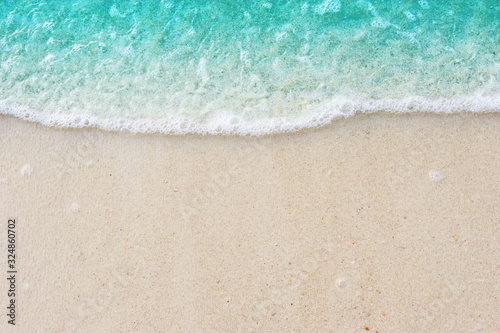 Fototapeta Naklejka Na Ścianę i Meble -  Turquoise Soft ocean blue wave on Fine sandy beach Background