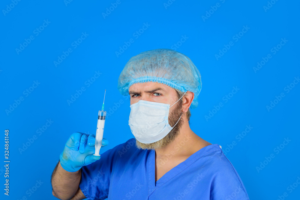 Doctor with syringe preparing for injection. Vaccination for people. Doctor warns about need for vaccination. Doctor with syringe. Medicine. Injection. Treatment in hospital. Concept of vaccination.