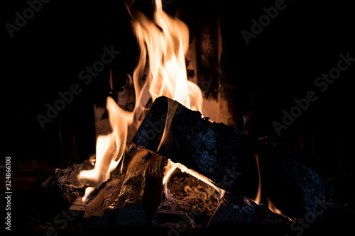 Burning firewood in the fireplace