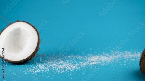 coconut falling with coconut powder- slow motion