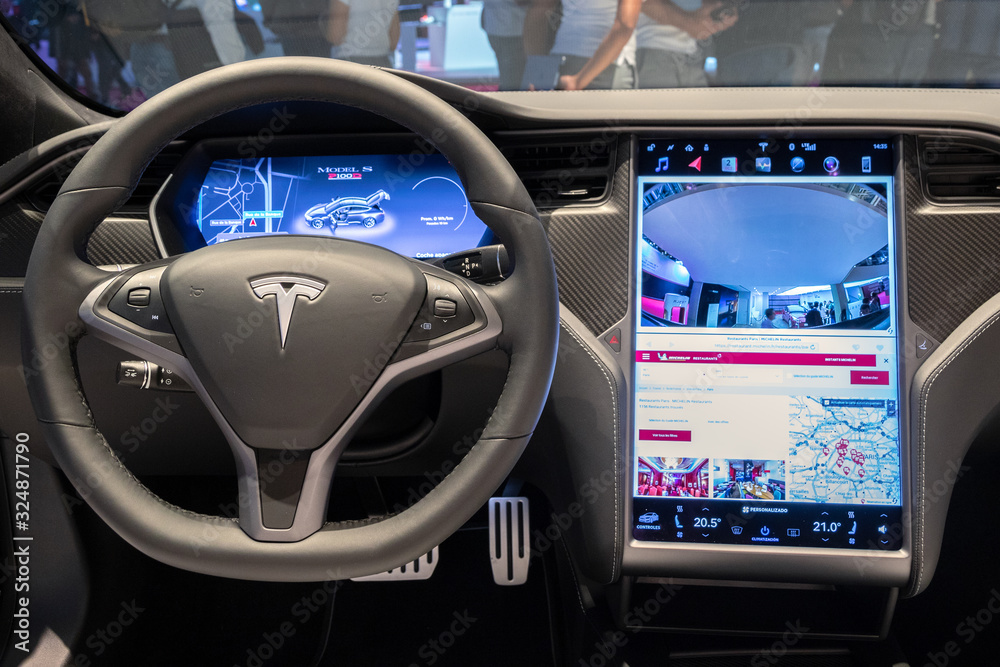 Interior dashboard view of the Tesla Model S P100D electric car showcased  at the Paris Motor Show. PARIS - OCT 2, 2018. Stock-Foto