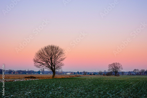 Countryside Landscape Under Scenic Colorful and dramatic Sky At Sunset or sunrise 