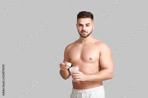 Sporty man with protein on ...