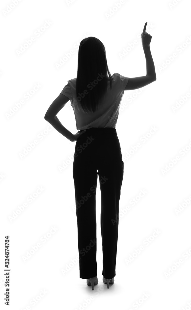 Silhouette of businesswoman pointing at something on white background. Concept of choice