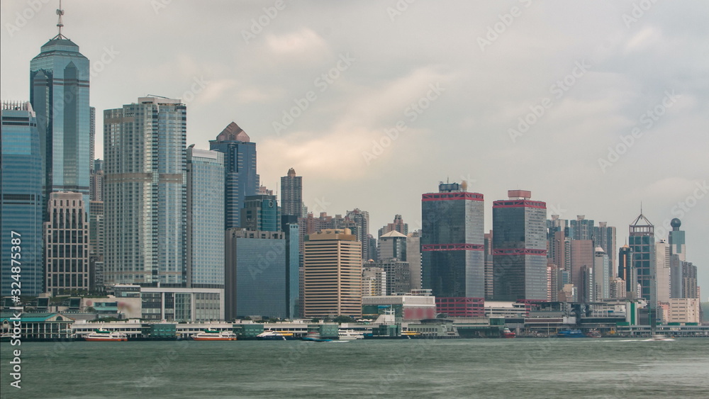 Hong Kong skyline in the morning over Victoria Harbour timelapse. Hong Kong skyline in the morning over Victoria Harbour timelapse.