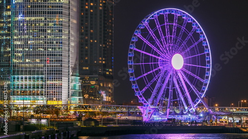 Photography Skycrapers night timelapse and Hong Kong Observation Wheel, which is the latest tourist attraction in the city