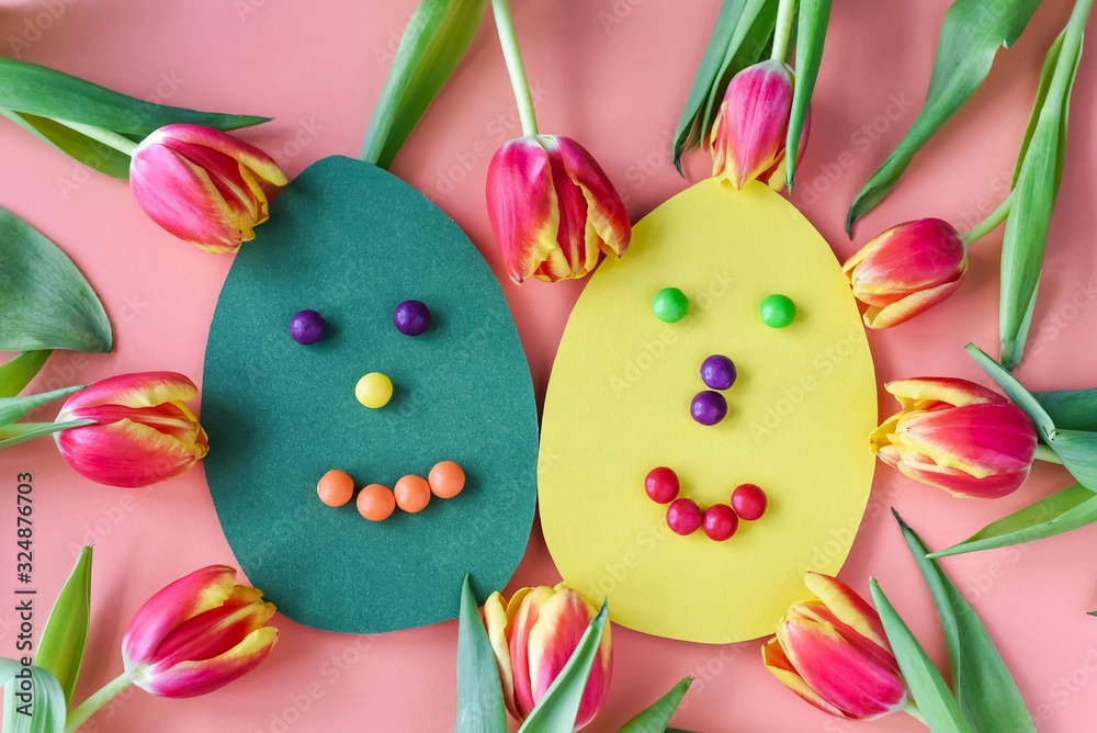 Yellow and green eggs with Funny Faces and red tulips
