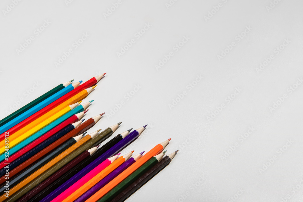 Arrangement of colourful pencils and copy space