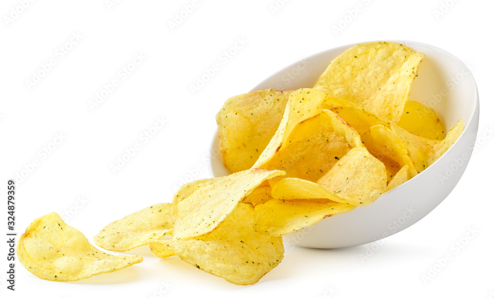 Potato chips with seasonings pour out of the plate on a white. Isolated Potato chips with seasonings pour out of the plate on a white. Isolated