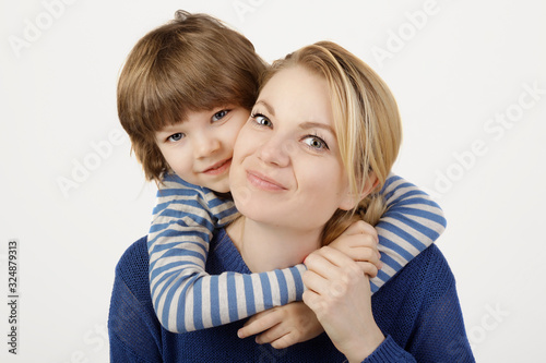 Mother and her little son hugging