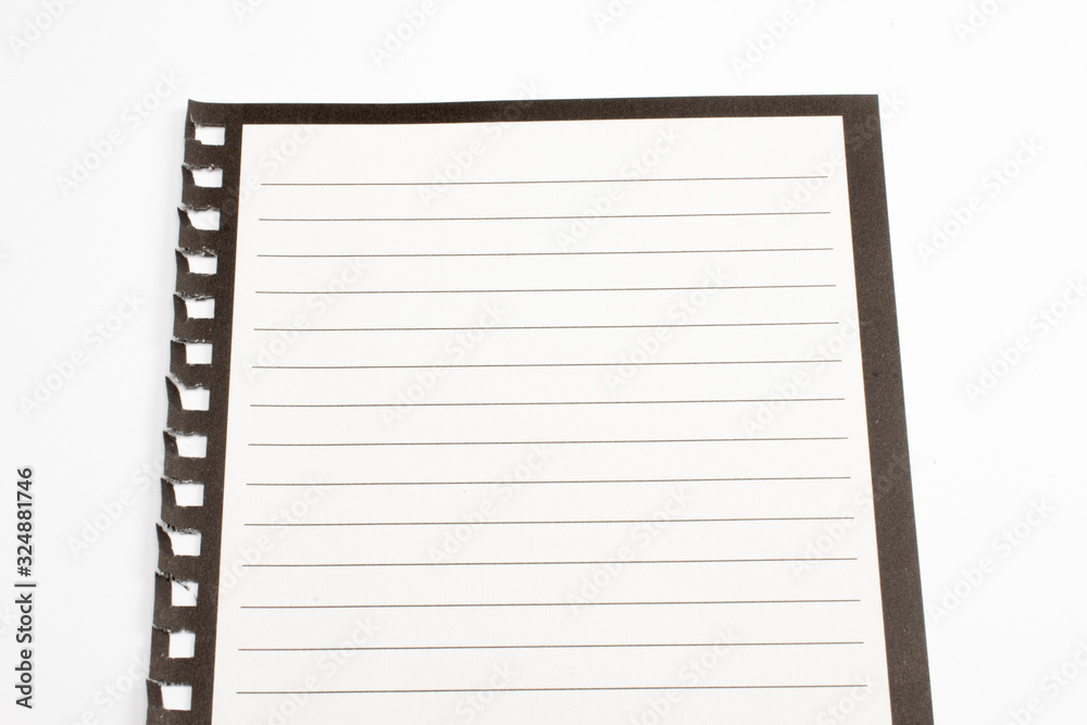 Blank diary sheet with rows on white background, close-up shot with selective focus. reminder, education. Blank diary sheet with rows on white background, close-up shot with selective focus. reminder, education.