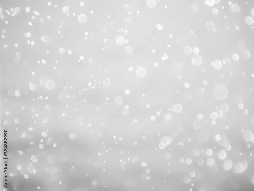 silver and white bokeh lights defocused. abstract background silver and white bokeh lights defocused. abstract background