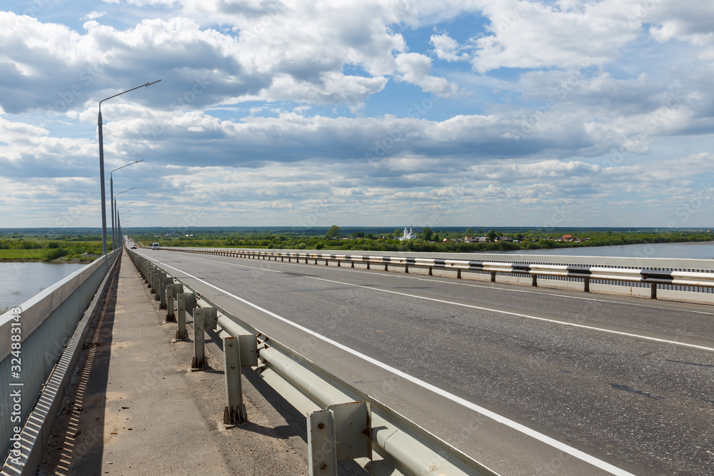 Fototapeta premium Bridge over the Severnaya Dvina river, Kotlas city, Arkhangelsk region, Russia