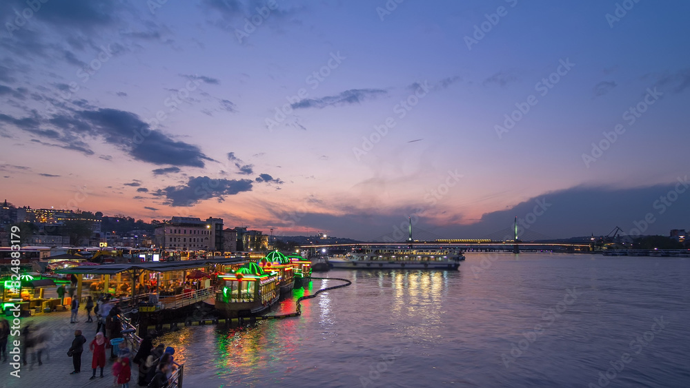 Passenger Ferries in the Golden Horn after sunset day to night timelapse, Istanbul skyline, Turkey