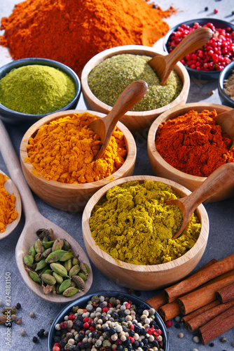 Fototapeta Naklejka Na Ścianę i Meble -  Variety of spices on kitchen table