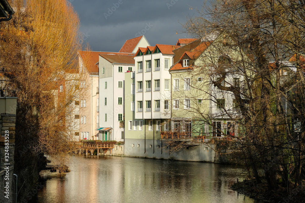 Obraz premium old town houses on a river