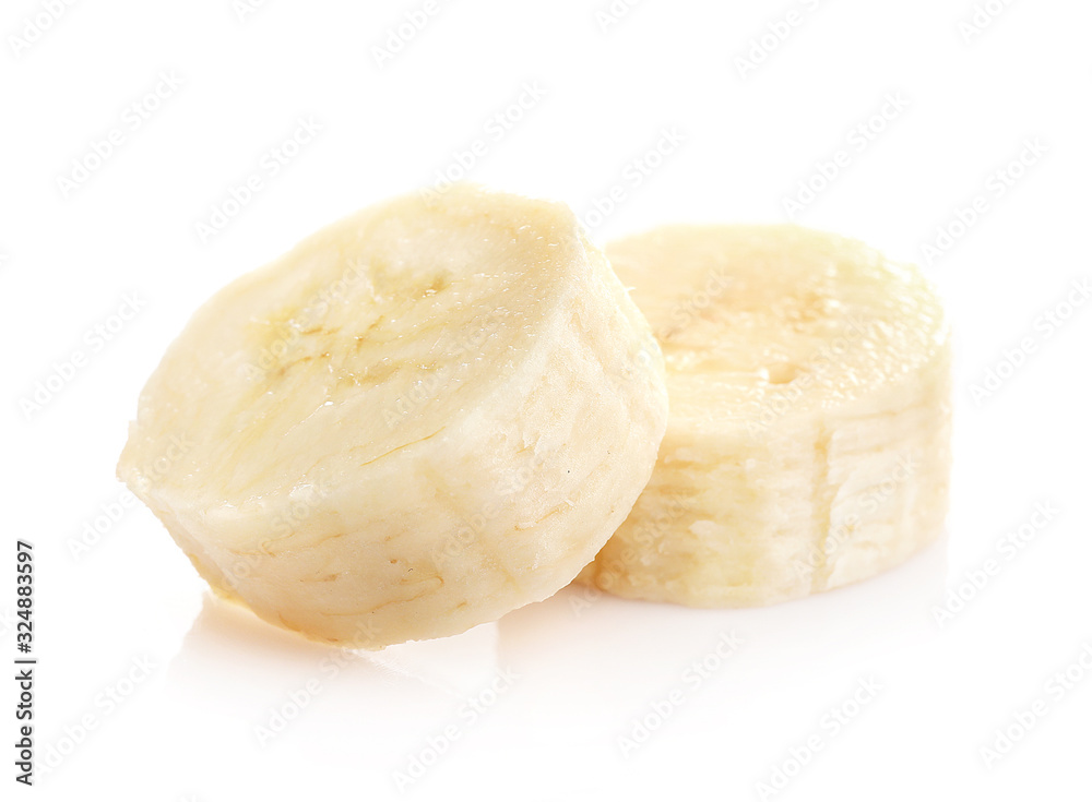 Ripe banana slices isolated on white background.