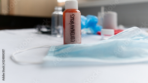 Coronavirus outbreak concept.Coronavirus diagnosis, laboratory testing to find and stop the spread of Wuhan coronavirus. Disease outbreak during the flu season. Protective medicines, pills, mask 