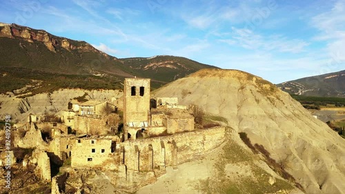 Esco abandoned village. Yesa reservoir area. Saragossa, Aragon, Spain. Europe. Aerial view. 4K.